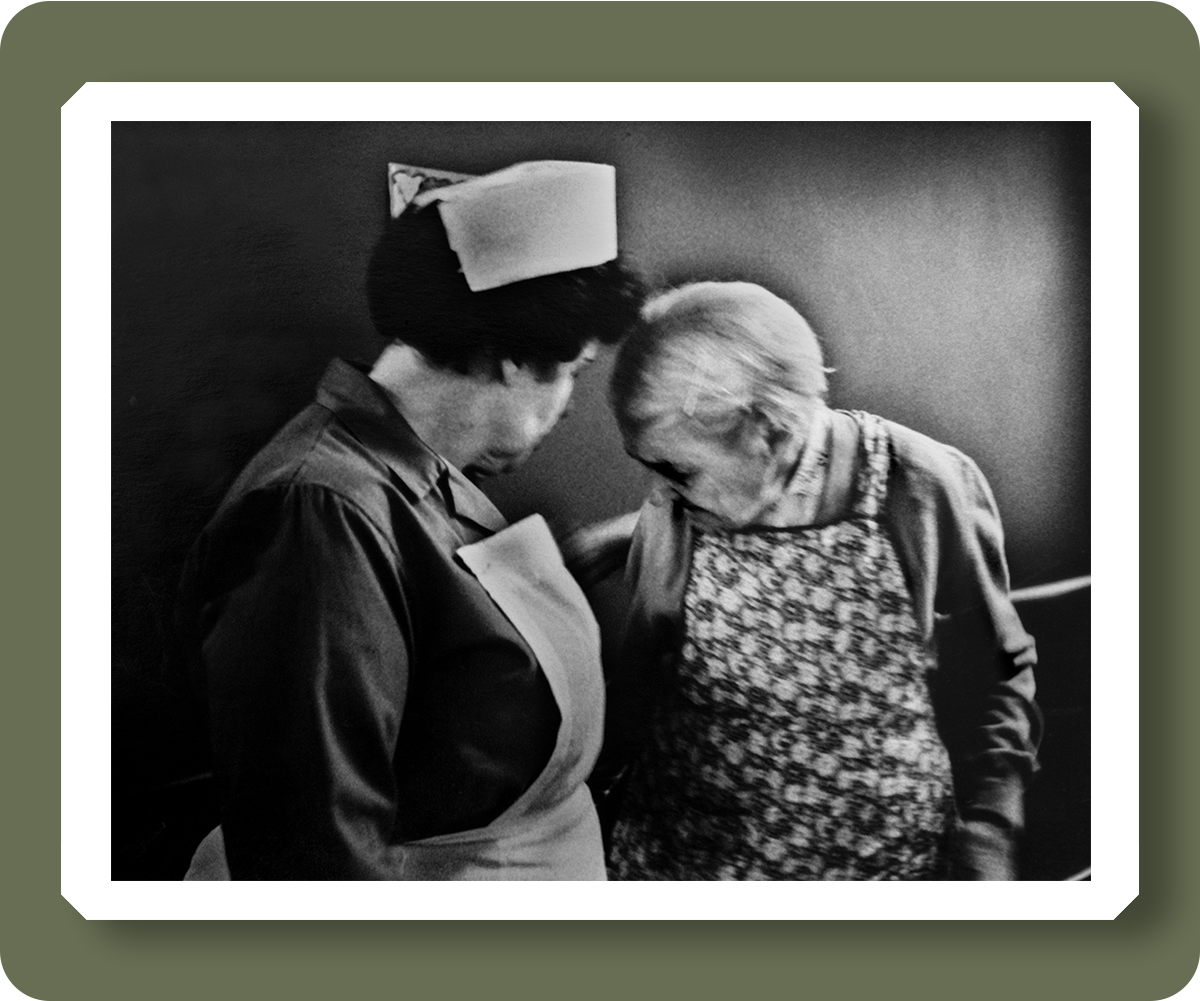 pd3017840: A nurse assists a patient  - Credit: Robert Golden / TopFoto