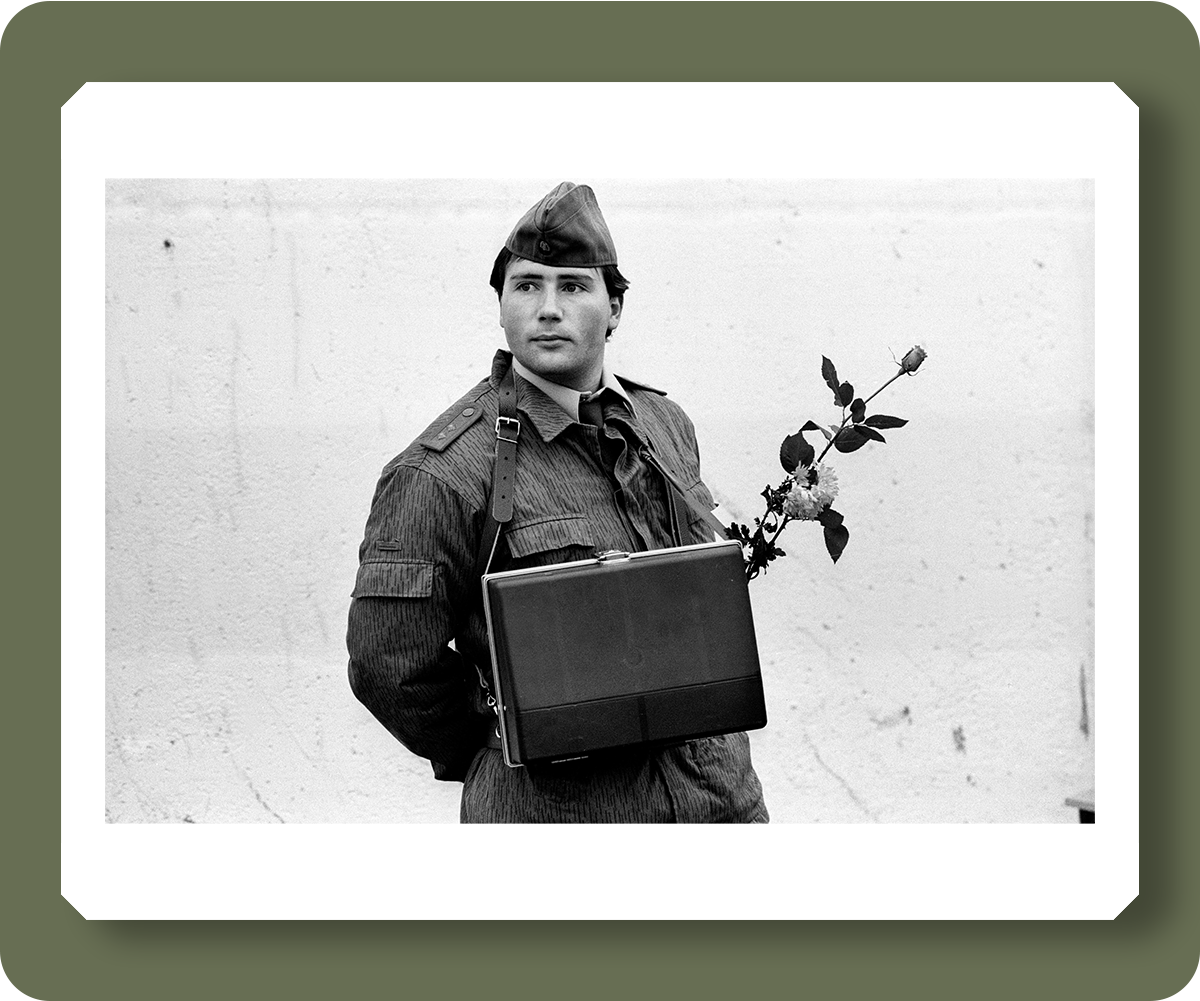 East German Border Force guard in the days leading up to the fall of the Berlin Wall - November 1989 - pd3025618 Credit: Brian Harris / The Independent / Topfoto  